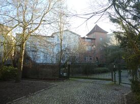 Wassermühle in Güstrow die Mühlentormühle - Ansicht der Rückseite mit alten Wasserturm 2025