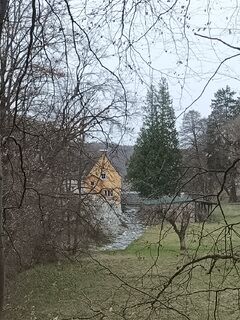 Wassermühle Goldenbaumer Mühle - Ansicht von Villa, Bachlauf und ganz klein der Rest der Wassermühle 2025