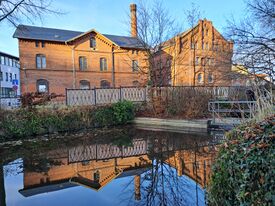 Wassermühle in Wismar die Alte Stadtmühle - Ansicht mit Zulauf des Mühlenteiches 2025